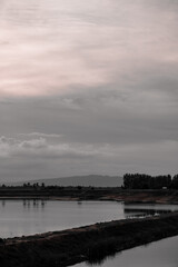 Obraz premium sunset over the river