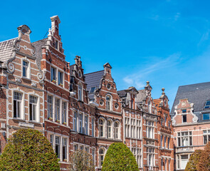 Fototapeta premium Cityscape of Leuven, Belgium with cityhall and beautiful historical buildings in Oude Markt in the old town .