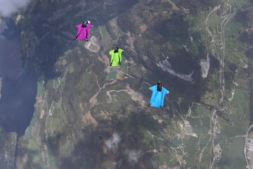 Skydivers over mountains in Norway