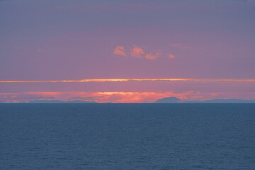 Pink sunset over the Atlantic ocean. Touristic concept