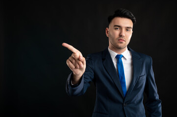 Portrait of business man wearing blue business suit and tie showing no gesture