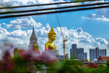 Close-up natural background of the waterfront community, a large Buddha statue (Wat Paknam Phasi...