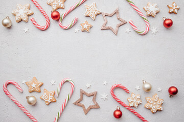 Christmas and New Year background. Composition of festive sweets and decorations with copy space. Winter holidays greeting card mockup