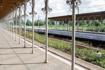 Beautiful railway platform. Summer landscape.