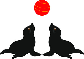 Seals are playing red ball isolated on white background.