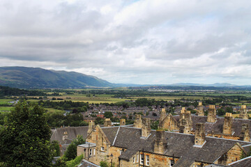 Fototapeta na wymiar Stirling, Scotland - August 1, 2020, cute houses and fields in a small town in the countryside