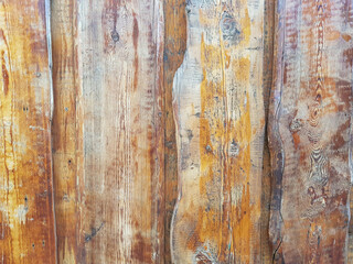 Rusty - brown texture of the wood. Abstract background, empty template. Close-up of a wall made of wooden planks. Grunge surface.