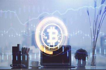 Double exposure of blockchain and crypto economy theme hologram and table with computer background....