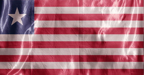 Fototapeta premium State flag fluttering in the wind. Colored background on textiles