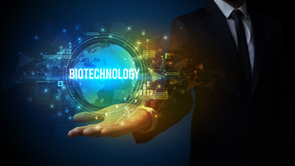 Elegant hand holding BIOTECHNOLOGY inscription, digital technology concept