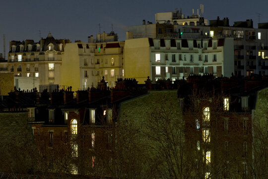 France, Paris, 13th arrondissement, residential buildings by night.