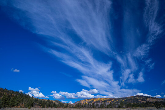 USA, Wyoming, autumn landscape with a cloudy sky, Cirrus and cumulo nimbus