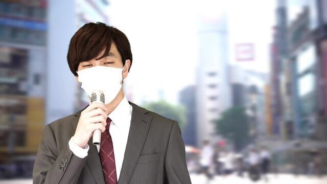 コロナ禍　渋谷スクランブル交差点　マスクのアナウンサー　リモート中継　イメージ　2020年