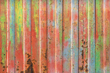 Obraz na płótnie Canvas Rusty colorful rolling shutter