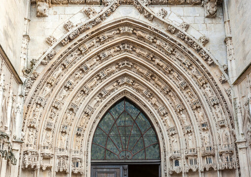 France, Charente Maritime, Saintes, detailed view of the gateway of Saint Peter's cathedral (arch mouldings decorated with 44 statues representing mus