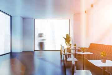 Woman walking in white restaurant