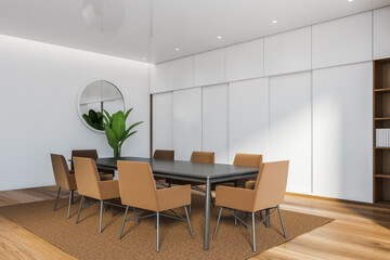 White dining room corner with mirror