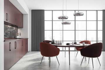 White and brown kitchen with dining table