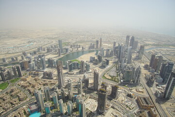 Fototapeta na wymiar Tall buildings in the future city, Dubai. The picture from a hight