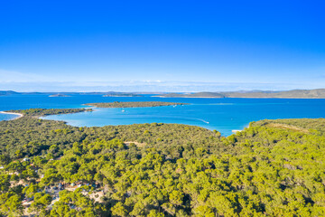 Amazing seascape on Adriatic sea, island of Dugi Otok in Croatia, Velebit mountain in background, aerial view from drone. 