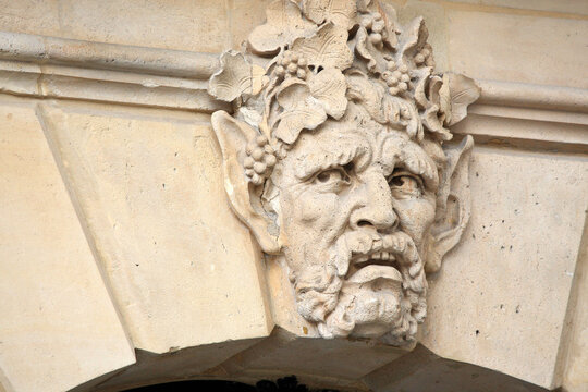France, Paris, place Vendome, detail of a sculpted face
