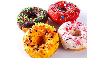 Set of colored donuts on a white background (close up)