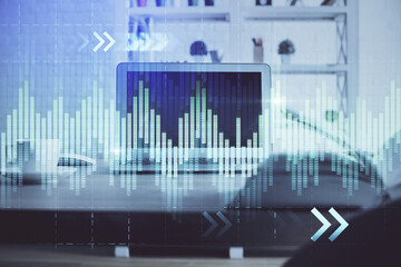 Forex market chart hologram and personal computer background. Multi exposure. Concept of investment.