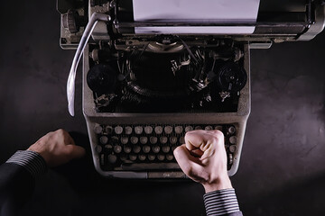 Vintage journalist tool. Typewriter retro. The writer is at work. Seal of the novel. Journalist writer concept.