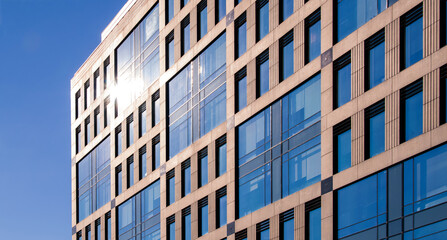 Exterior of modern architecture in the city center. Construction abstract background. Detail of the facade with windows.