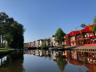 Fototapeta na wymiar Canal around the old town of Sneek