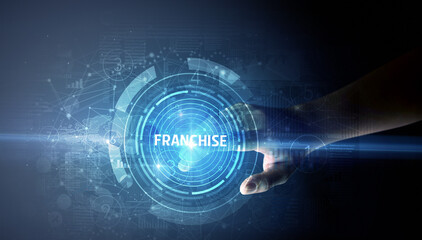 Hand touching FRANCHISE button, modern business technology concept