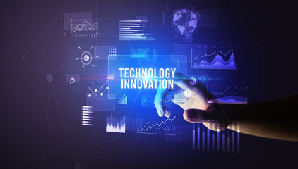 Hand touching TECHNOLOGY INNOVATION inscription, new business technology concept