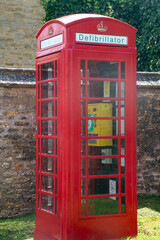 Traditional British Telephone Box in village converted to defibrillator