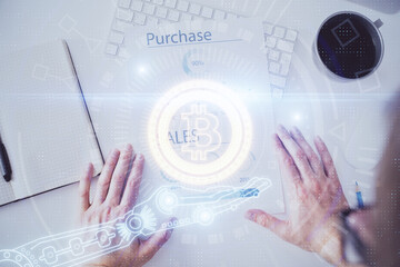 Man's hands working with notes background. Cryptocurrency and finance concept.