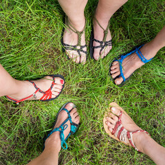 Hand made barefoot sandals on feet.