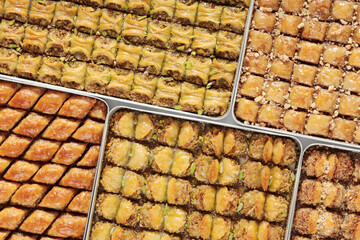 Traditional Dessert Turkish Baklava. Walnut, Pistachio Turkish Style Antep Baklava Presentation. Baklava from Turkish cuisine.
