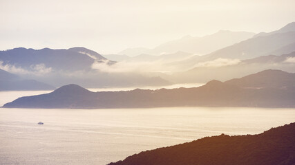 Hong Kong ocean sunset mountain heaven background nautical vessel cargo ship industry