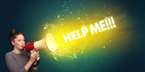 Young woman yelling to loudspeaker with HELP ME!!! inscription, modern media concept