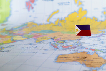 Fototapeta na wymiar Philippine flag on the map