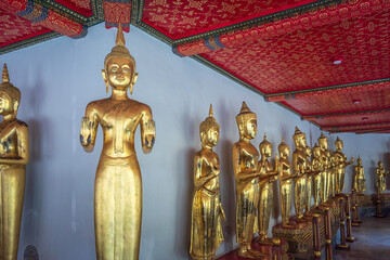 Bangkok, Thailand - August 14, 2020:  Buddha images in a row at Wat Pho, also known as Wat Phra...