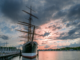 View to the Travemünde Port area with a four masted sail boat at the foreground