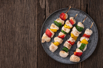bbq chicken stick with bell pepper on wood
