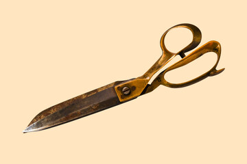 rusty tailor scissor isolated on cream color background