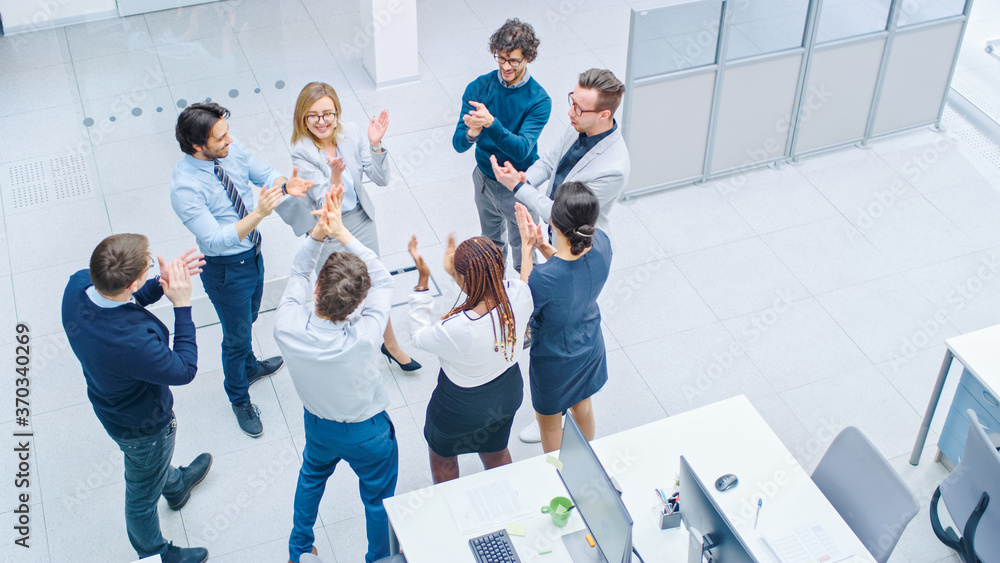 Poster eight successful office workers doing team building exercise and applauding together in the unifying