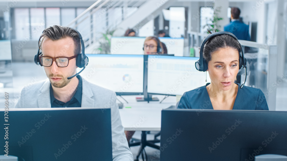 Poster in modern open space office: team of customer support people and salesmen working at their on deskto