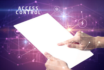 Holding futuristic tablet with ACCESS CONTROL inscription, cyber security concept