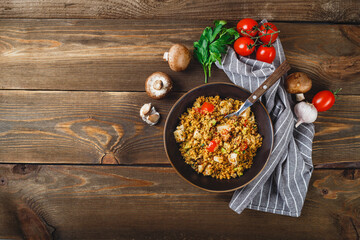 Couscous with turkey, tomatoes, champignon mushrooms and avocado.