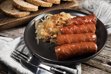 Fried sausage with onion.