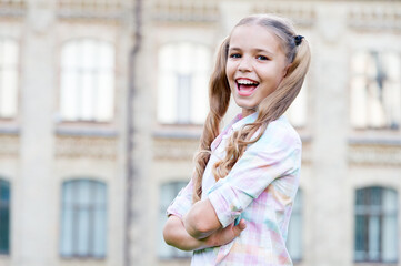 Little girl casual style teen with gorgeous curly hairstyle, happiness and joy concept