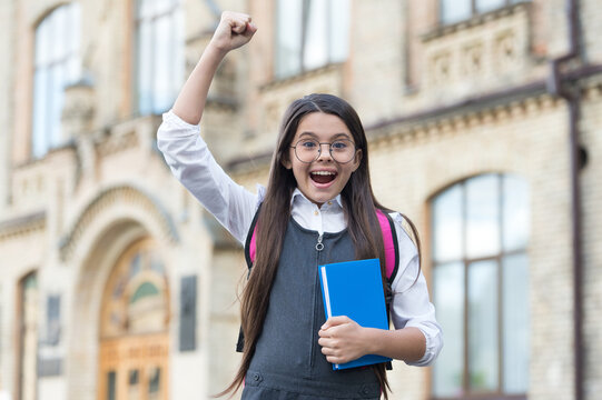 Yes, We Make Winners. Happy Winner Outdoors. Small Kid Make Winning Gesture. Scholarship Winner. Success In Study. Back To School. Formal Education. Knowledge Day. September 1. You Can Do It